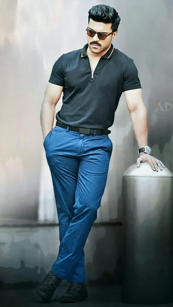 ram Charan in black half sleeve shirt blue jeans